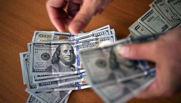 Sepa aquí a cuánto se cotiza el dólar en Colombia este 18 de enero de 2022. (Foto: AFP)