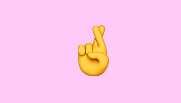Si no sabes el significado real de los dedos cruzados en WhatsApp, aquí te lo damos a conocer. (Foto: Emojipedia)