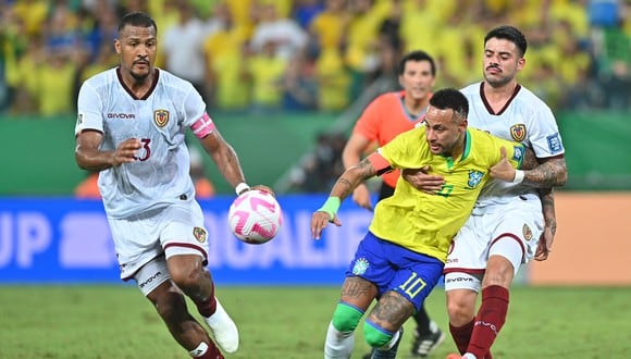 Neymar Jr (c) of Brazil disputes the ball with Junior Moreno (d) of Venezuela today during a South American Qualifiers match for the 2026 World Cup between Brazil and Venezuela at the Arena Pantanal stadium in Cuiaba, Brazil. Photo by Andre Borges / EFE