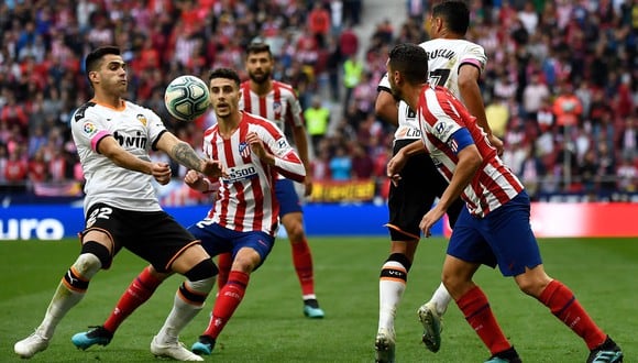 Valencia juega contra Atlético Madrid por LaLiga Santander. Conoce las horas y canales TV para ver todos los partidos de hoy, viernes 14 de febrero. (Foto: AFP)