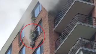 Un héroe: bombero rescata a mujer atrapada en ventana del piso 16 de edificio tras incendio