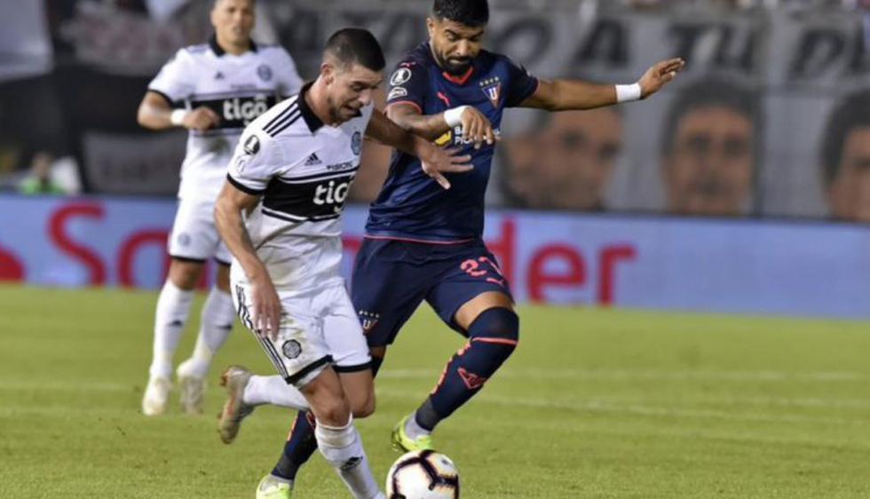 Liga de Quito, a cuartos de Copa Libertadores al empatar 1-1 con Olimpia en Asunción.