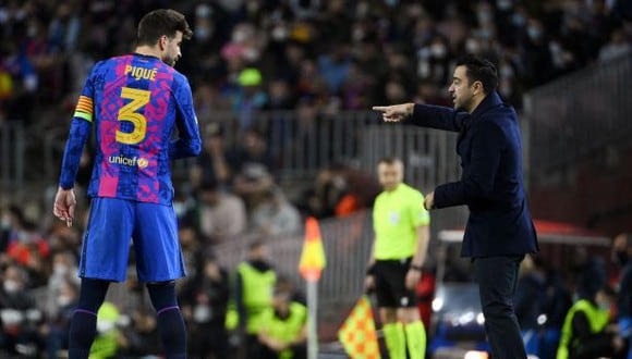 Xavi y Gerard Piqué fueron compañeros en FC Barcelona durante siete temporadas. (Foto: AFP)