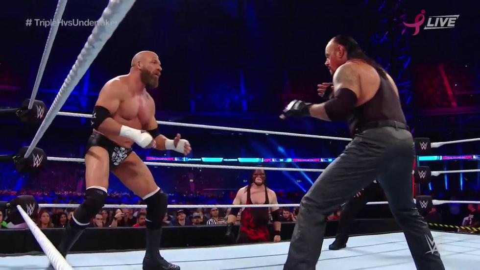 Mejores imágenes de la pelea entre The Undertaker  vs Triple H. (WWE)