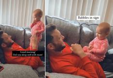 Bebé usa sus manitos para tratar de comunicarse con su padre sordo y escena se vuelve viral