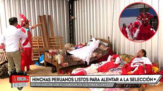 Paraguay vs Perú: hinchas se alojan en taller mecánico de Ciudad del Este