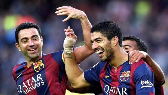 Xavi y Suárez jugaron juntos en la temporada 2014-15. (Foto: AFP)