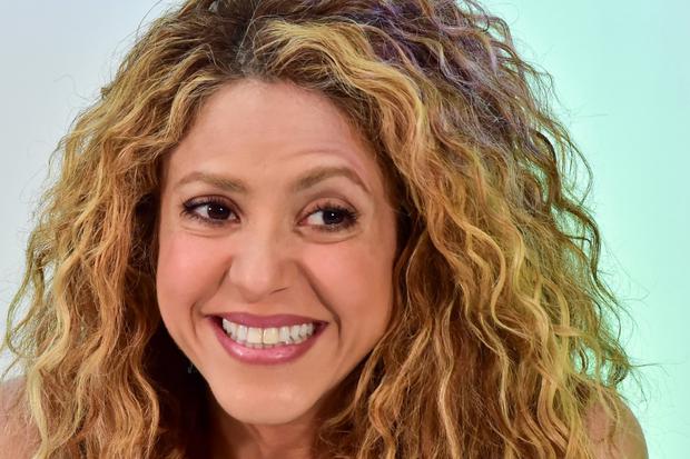 Shakira sonriendo en un evento público (Foto: AFP)