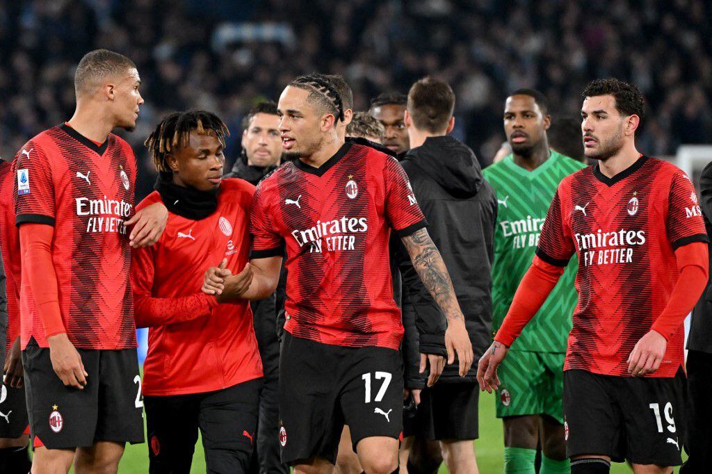AC Milan's Swiss forward #17 Noah Okafor celebrates with teammates at the end of the Italian Serie A football match between Lazio and AC Milan on March 01, 2024 at the Olympic stadium in Rome. (Photo by Alberto PIZZOLI / AFP)