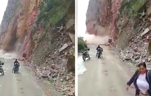 Viral video: People stay to watch a hill collapse