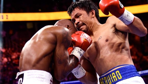 Pacquiao no pudo ante Yordenis Ugás y cayó en la pelea por el título de la AMB | Foto: AFP