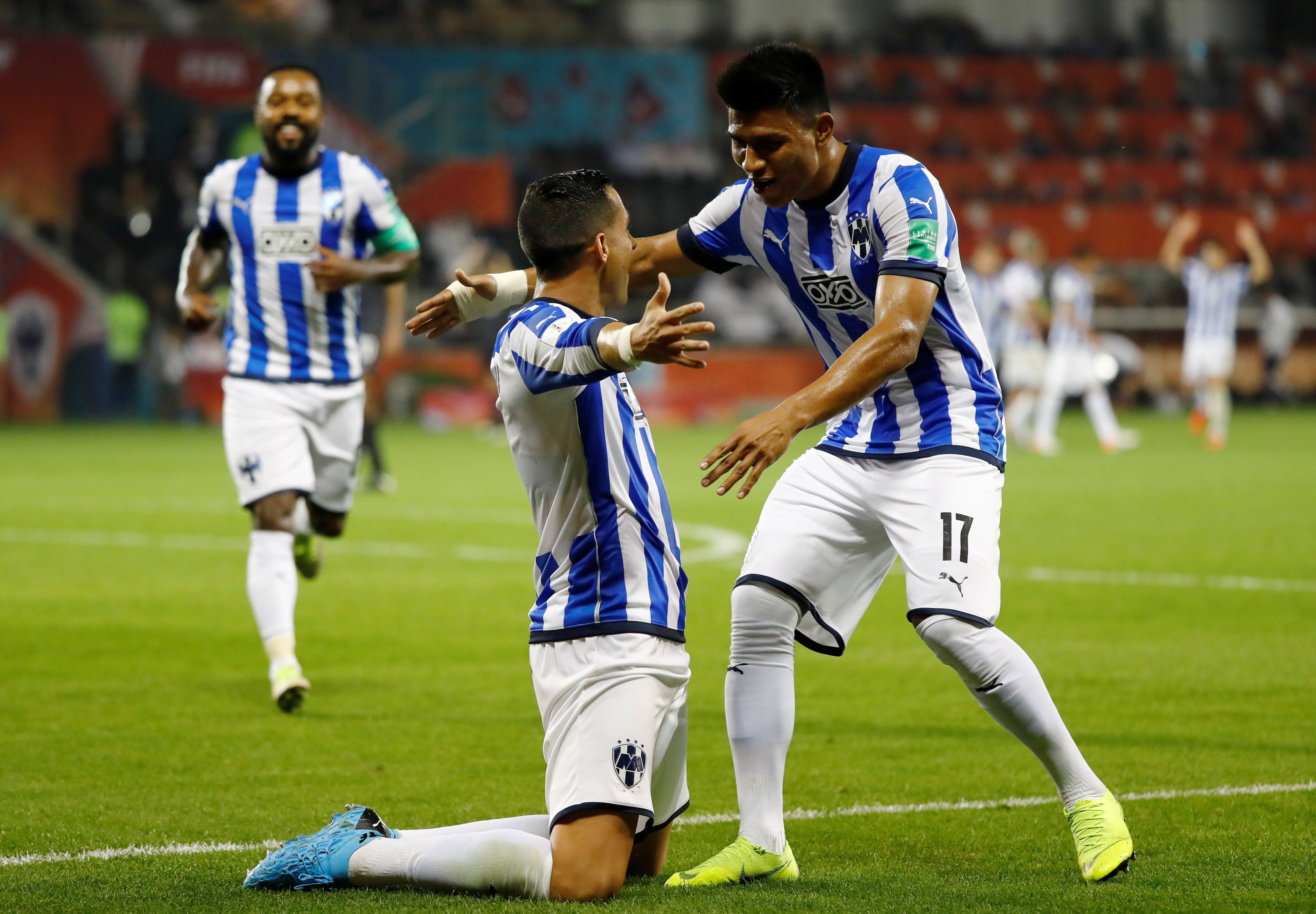 Soccer Football - Club World Cup - Quarter Final - Monterrey v Al Sadd SC - Jassim Bin Hamad Stadium, Doha, Qatar - December 14, 2019  Monterrey's Rogelio Funes celebrates scoring their second goal with Jesus Gallardo    REUTERS/Corinna Kern