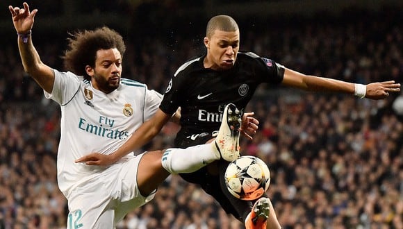 Real Madrid y PSG se verán las caras por los octavos de final de Champions League en febrero. (Foto: AFP)