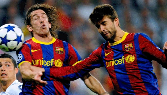 Puyol y Piqué jugaron juntos en el Barcelona durante seis temporadas. (Foto: AFP)