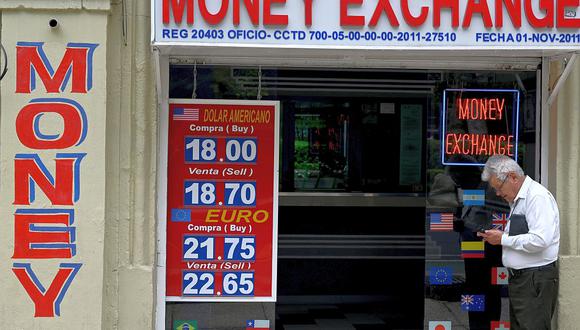 El tipo de cambio en el mercado mexicano abría a la baja este martes 25 de mayo . (Foto: AFP)
