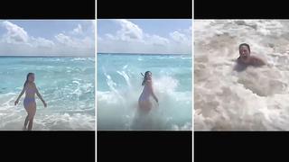 Viral: Distraída joven es derribada por ola y arrastrada por el mar