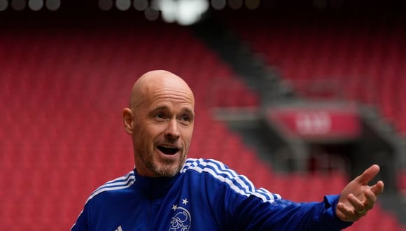 Ajax coach Erik Ten Hag reacts when waiting for an interview at the ArenA stadium in Amsterdam, Netherlands, Friday, April 15, 2022. British and Dutch media are reporting that Ten Hag has reached a verbal agreement to coach Manchester United.(AP Photo/Peter Dejong)