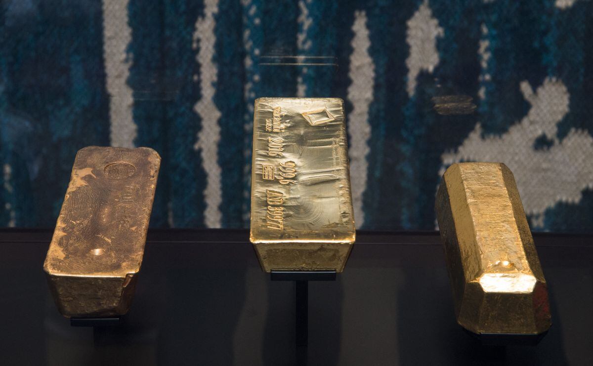 Tres lingotes de oro (Foto: AFP)