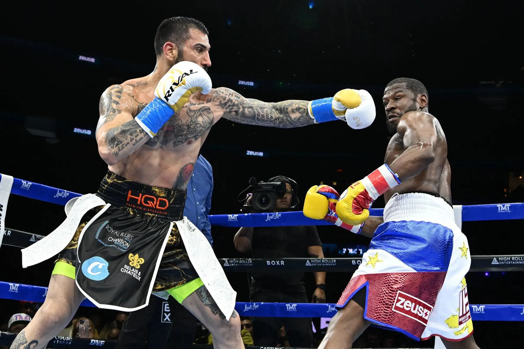 John Gotti III y Floyd Mayweather en plena pelea.