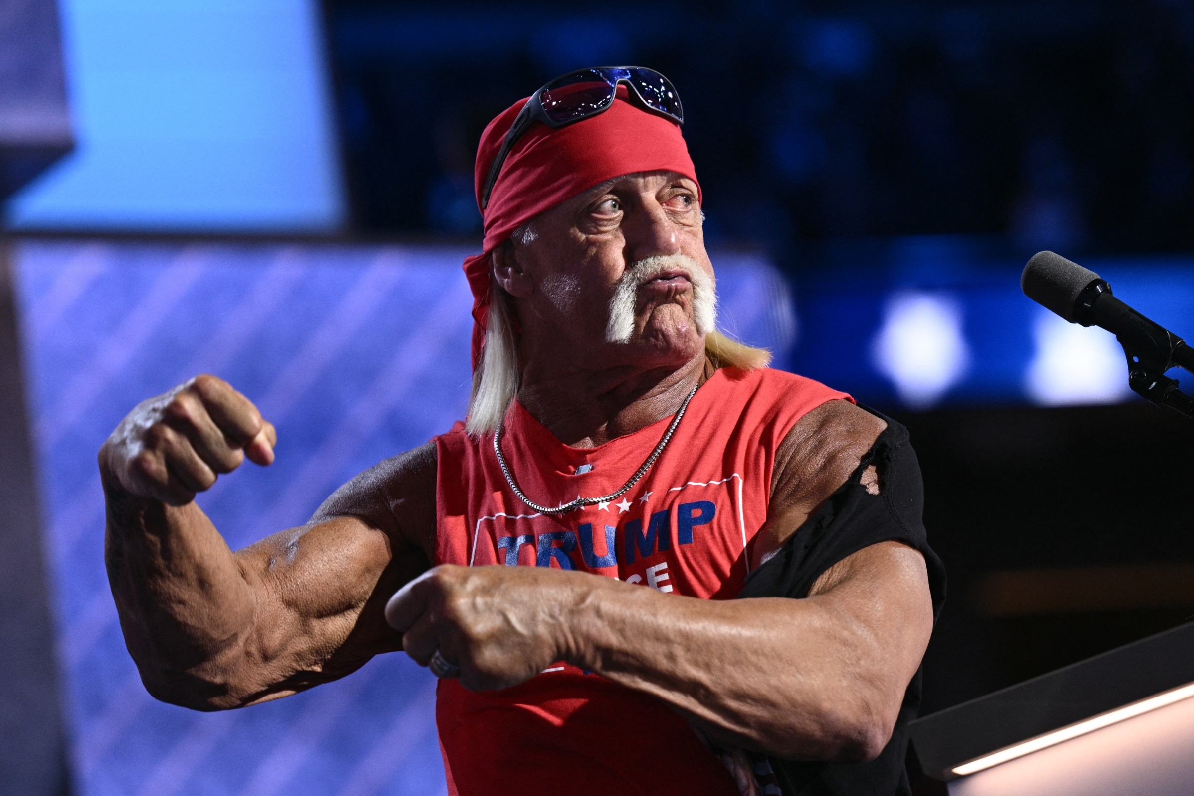 Wrestling legend Hulk Hogan was taken by stretcher from his Florida home after suffering a reported cardiac arrest. He passed away at age 71. (Photo: AFP)