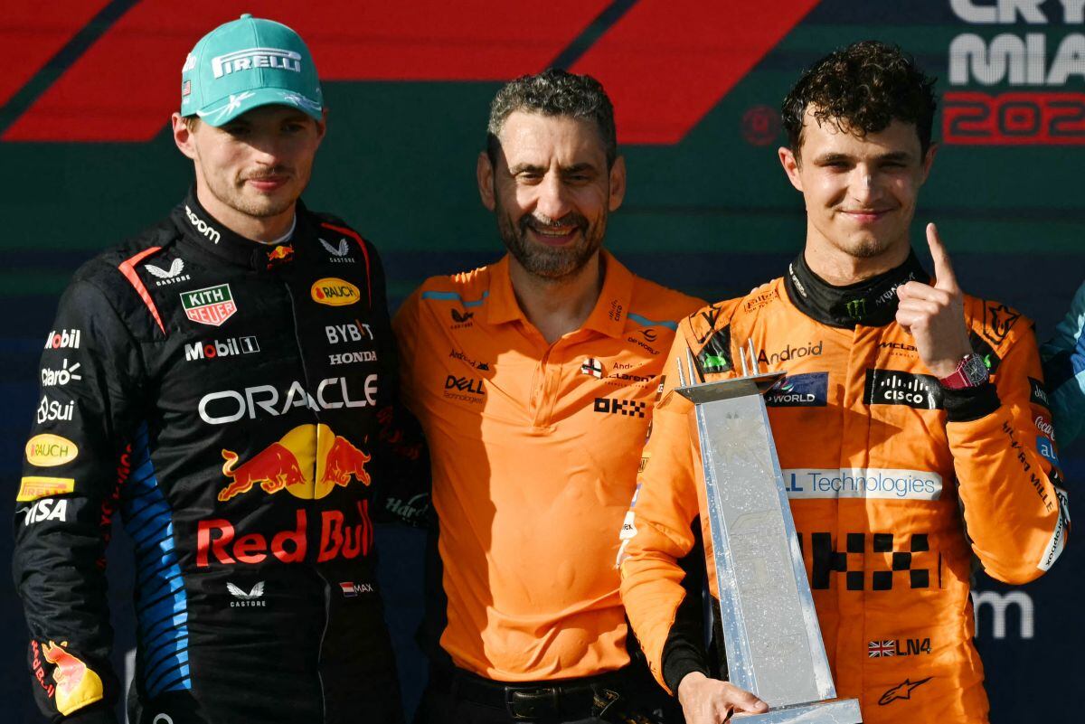 (L-R) Second place, Red Bull Racing's Dutch driver Max Verstappen; McLaren's Italian team principal Andrea Stella; first place, McLaren's British driver Lando Norris; and third place, Ferrari's Monegasque driver Charles Leclerc, stand on the podium after the 2024 Miami Formula One Grand Prix at Miami International Autodrome in Miami Gardens, Florida, on May 5, 2024. (Photo by Jim WATSON / AFP)