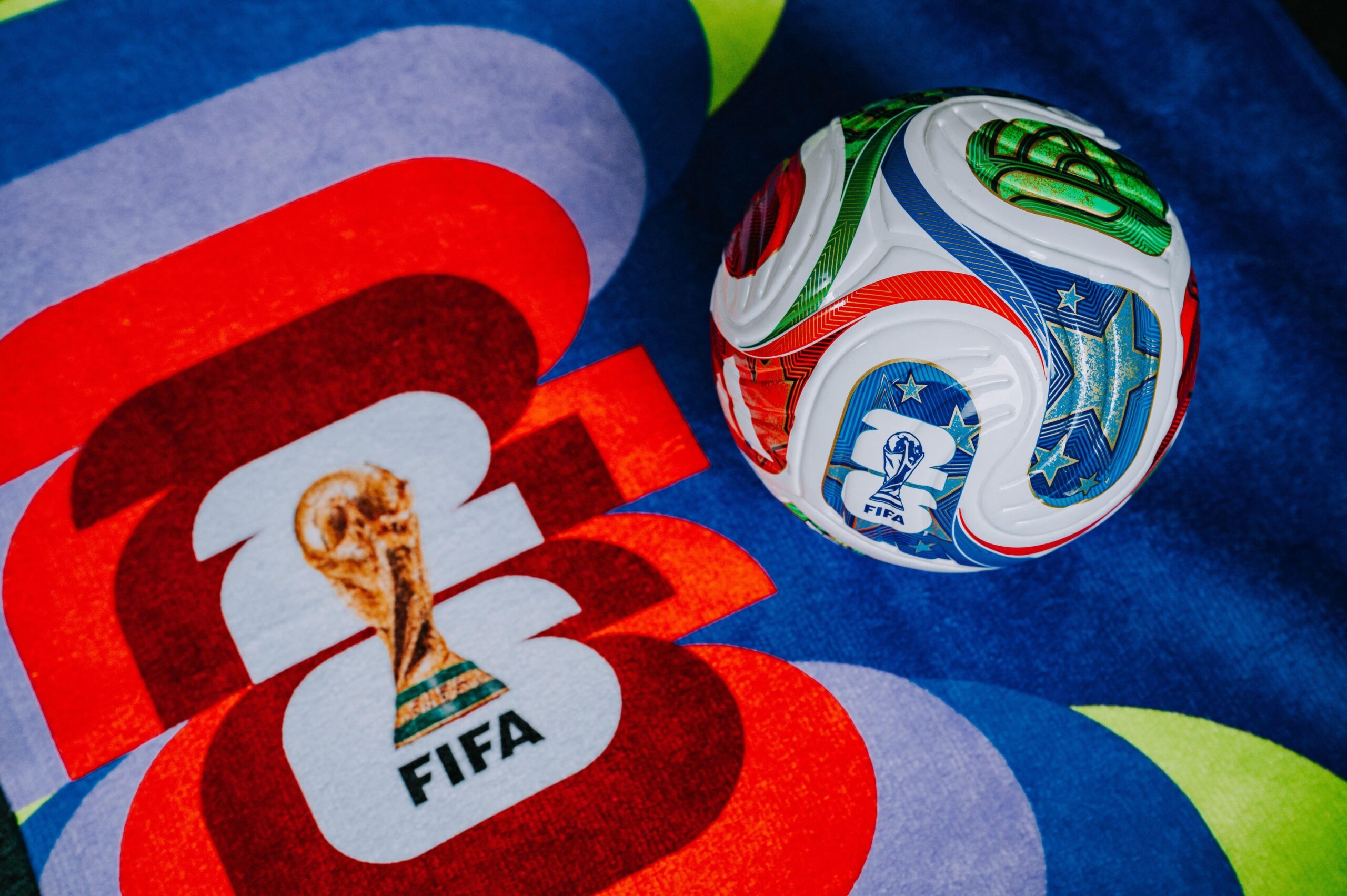 LOS ANGELES, USA, NOVEMBER 11, 2025: FIFA World Cup in 2026 background, official football ball and logo of World cup in United States, Mexico and Canada.