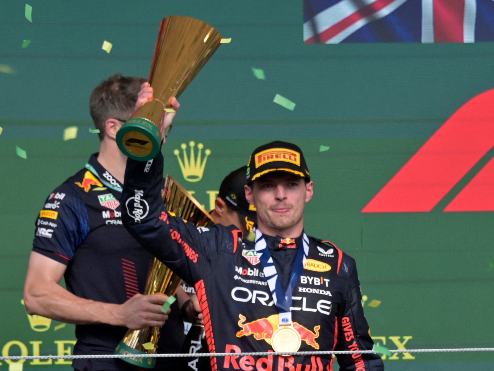 Red Bull Racing's Dutch driver Max Verstappen celebrates on the podium after winning the Formula One Brazilian Grand Prix at the Jose Carlos Pace racetrack, also known as Interlagos, in Sao Paulo, Brazil, on November 5, 2023. | Photo by Nelson Almedia / AFP