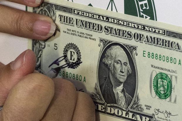Un billete de dólar único para los coleccionistas (Foto: AFP)