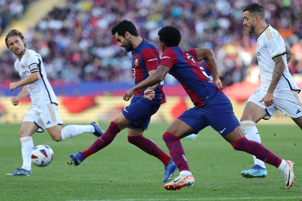 Real Madrid y Barcelona chocan este domingo por el Clásico de España. (Foto: AFP)
